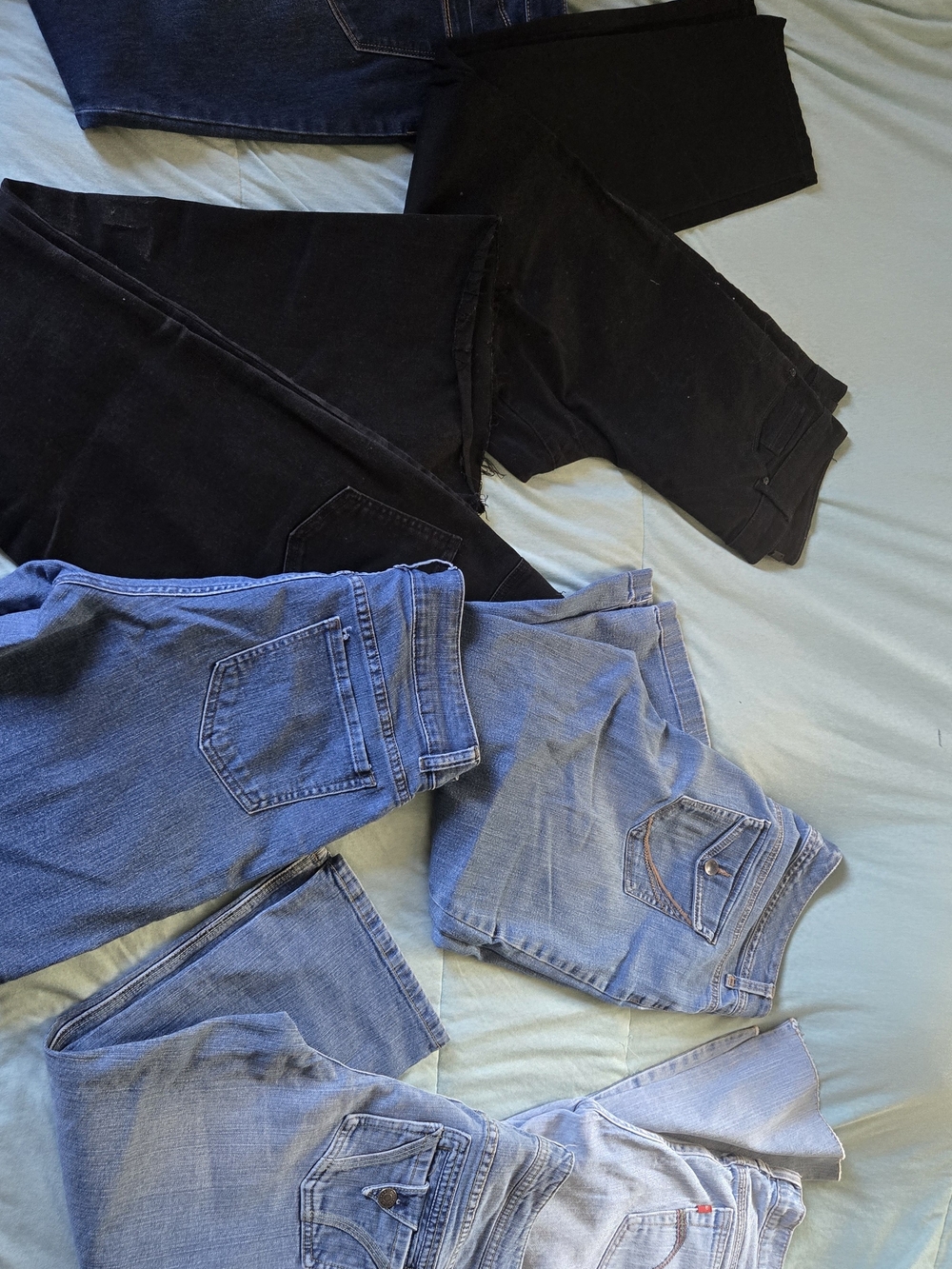 7 Pairs Straight Leg Women’s Jeans And Capris in Black and Light Blue Denim
